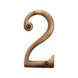 This is an image of a Heritage Brass - Numeral 2 Face Fix 76mm (3") Antique Brass Finish, c1560-2-at that is available to order from T.H Wiggans Ironmongery in Kendal.