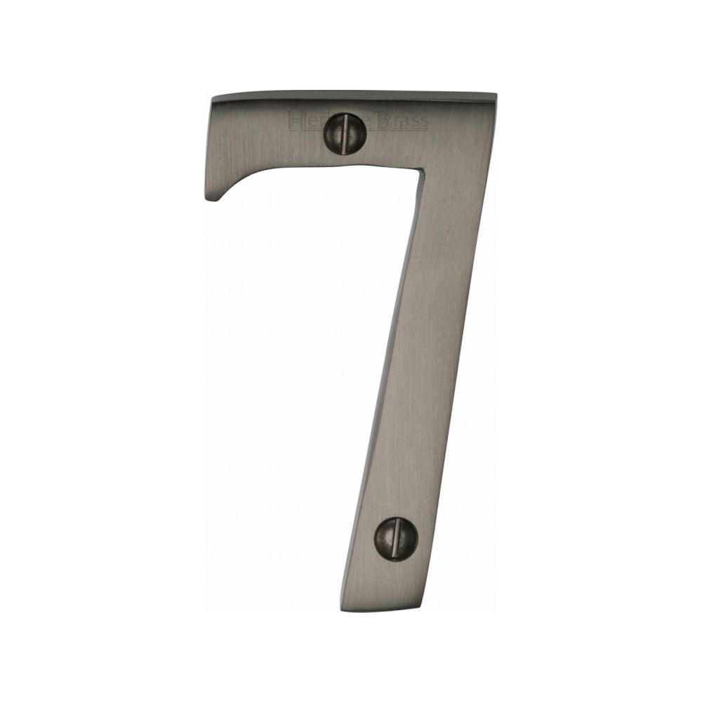 This is an image of a Heritage Brass - Numeral 7 Face Fix 76mm (3") Matt Bronze Finish, c1560-7-mb that is available to order from T.H Wiggans Ironmongery in Kendal.