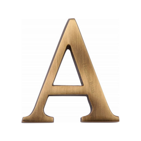 This is an image of a Heritage Brass - Alphabet A Pin Fix 51mm (2") Antique Brass Finish, c1565-2-a-at that is available to order from T.H Wiggans Ironmongery in Kendal.