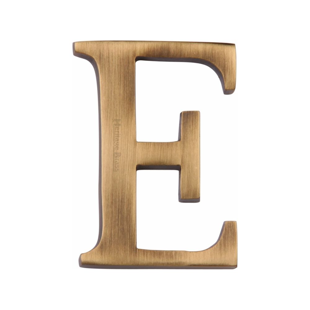This is an image of a Heritage Brass - Alphabet E Pin Fix 51mm (2") Antique Brass Finish, c1565-2-e-at that is available to order from T.H Wiggans Ironmongery in Kendal.