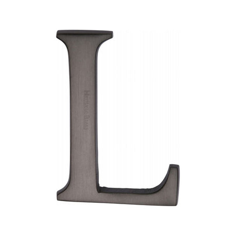 This is an image of a Heritage Brass - Alphabet L Pin Fix 51mm (2") Matt Bronze Finish, c1565-2-l-mb that is available to order from T.H Wiggans Ironmongery in Kendal.