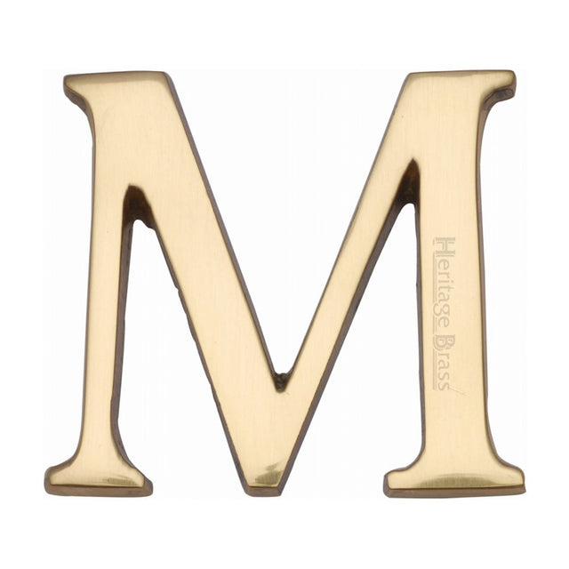 This is an image of a Heritage Brass - Alphabet M Pin Fix 51mm (2") Polished Brass Finish, c1565-2-m-pb that is available to order from T.H Wiggans Ironmongery in Kendal.