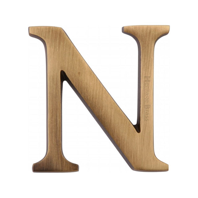 This is an image of a Heritage Brass - Alphabet N Pin Fix 51mm (2") Antique Brass Finish, c1565-2-n-at that is available to order from T.H Wiggans Ironmongery in Kendal.