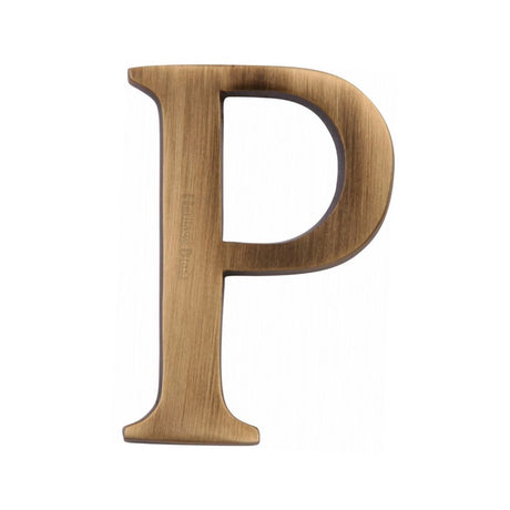 This is an image of a Heritage Brass - Alphabet P Pin Fix 51mm (2") Antique Brass Finish, c1565-2-p-at that is available to order from T.H Wiggans Ironmongery in Kendal.