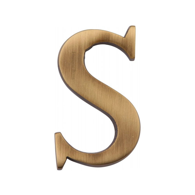This is an image of a Heritage Brass - Alphabet S Pin Fix 51mm (2") Antique Brass Finish, c1565-2-s-at that is available to order from T.H Wiggans Ironmongery in Kendal.