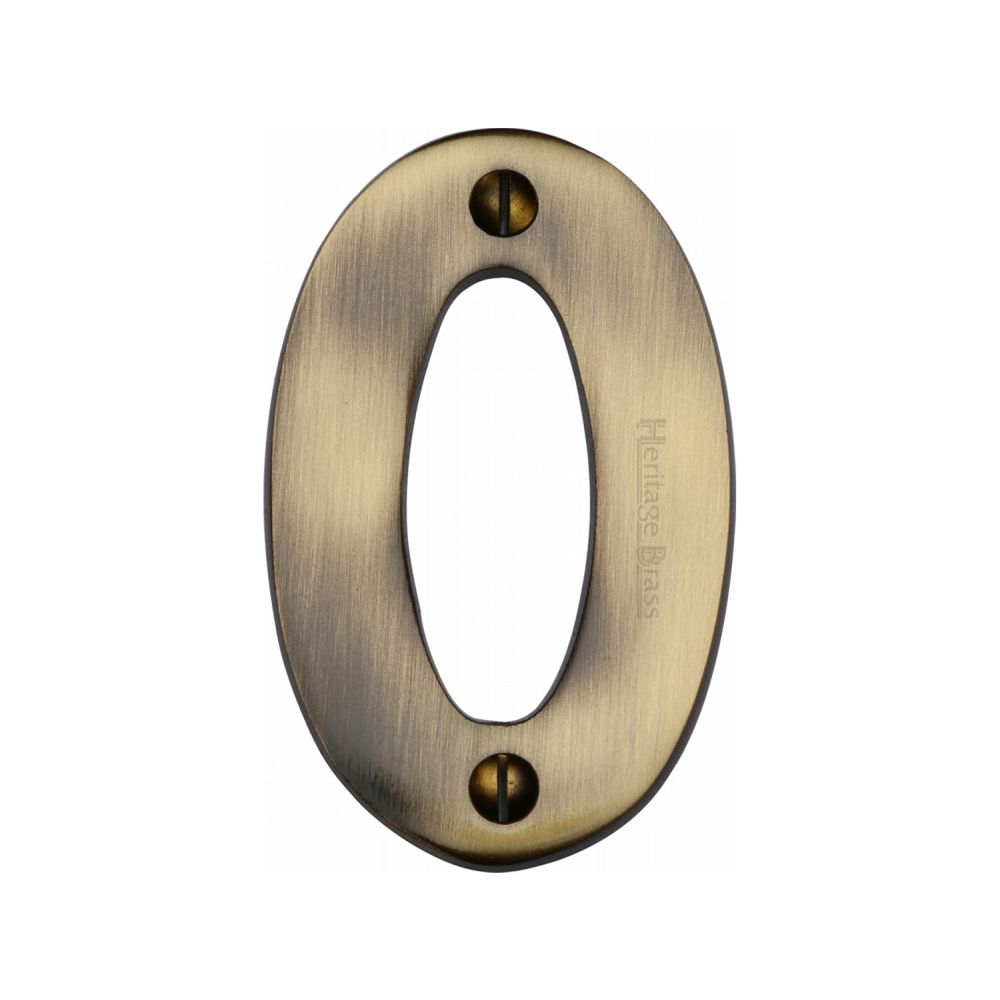 This is an image of a Heritage Brass - Numeral 0 Face Fix 76mm (3") Antique Brass Finish, c1566-0-at that is available to order from T.H Wiggans Ironmongery in Kendal.