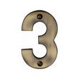 This is an image of a Heritage Brass - Numeral 3 Face Fix 76mm (3") Antique Brass Finish, c1566-3-at that is available to order from T.H Wiggans Ironmongery in Kendal.
