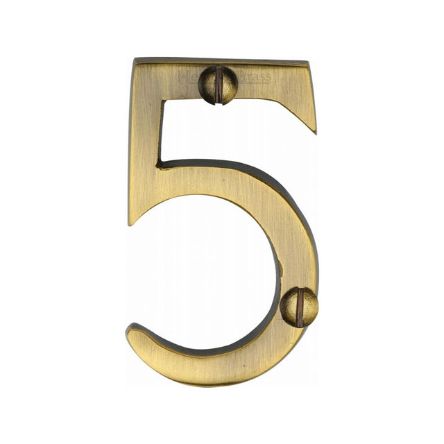 This is an image of a Heritage Brass - Numeral 5 Face Fix 51mm (2") Antique Brass Finish, c1567-5-at that is available to order from T.H Wiggans Ironmongery in Kendal.