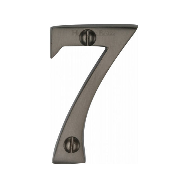 This is an image of a Heritage Brass - Numeral 7 Face Fix 51mm (2") Matt Bronze Finish, c1567-7-mb that is available to order from T.H Wiggans Ironmongery in Kendal.