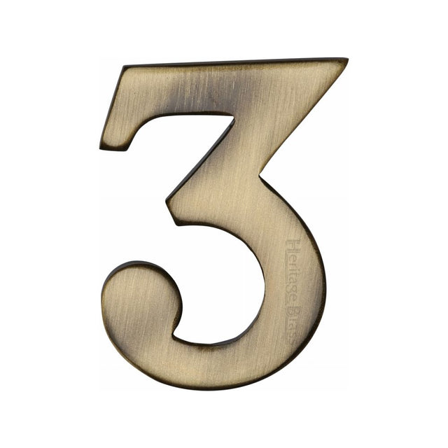 This is an image of a Heritage Brass - Numeral 3 Self Adhesive 51mm (2") Antique Brass Finish, c1568-3-at that is available to order from T.H Wiggans Ironmongery in Kendal.