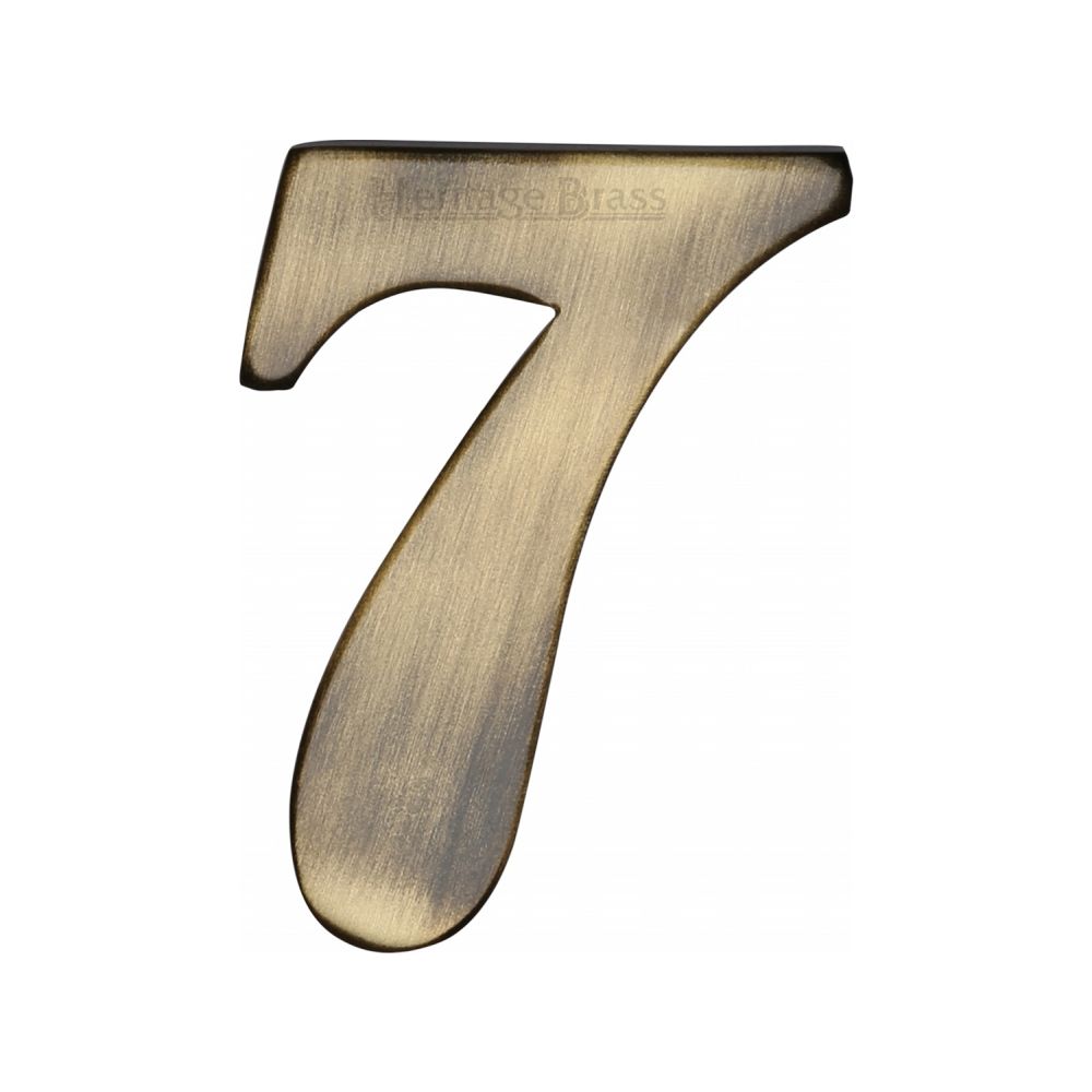 This is an image of a Heritage Brass - Numeral 7 Self Adhesive 51mm (2") Antique Brass Finish, c1568-7-at that is available to order from T.H Wiggans Ironmongery in Kendal.