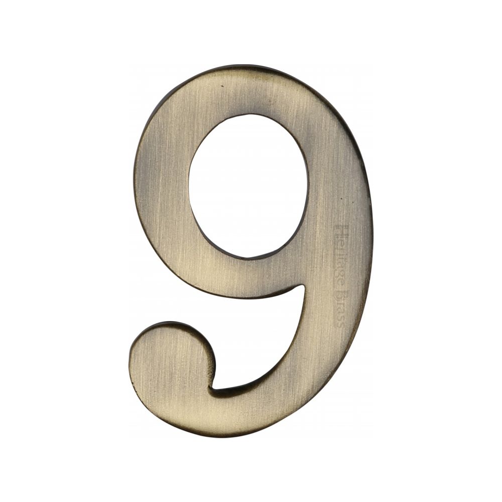 This is an image of a Heritage Brass - Numeral 9 Self Adhesive 51mm (2") Antique Brass Finish, c1568-9-at that is available to order from T.H Wiggans Ironmongery in Kendal.