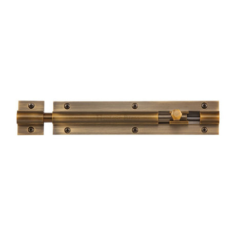 This is an image of a Heritage Brass - Door Bolt Straight 8" x 1.25" Antique Brass Finish, c1582-8-at that is available to order from T.H Wiggans Ironmongery in Kendal.