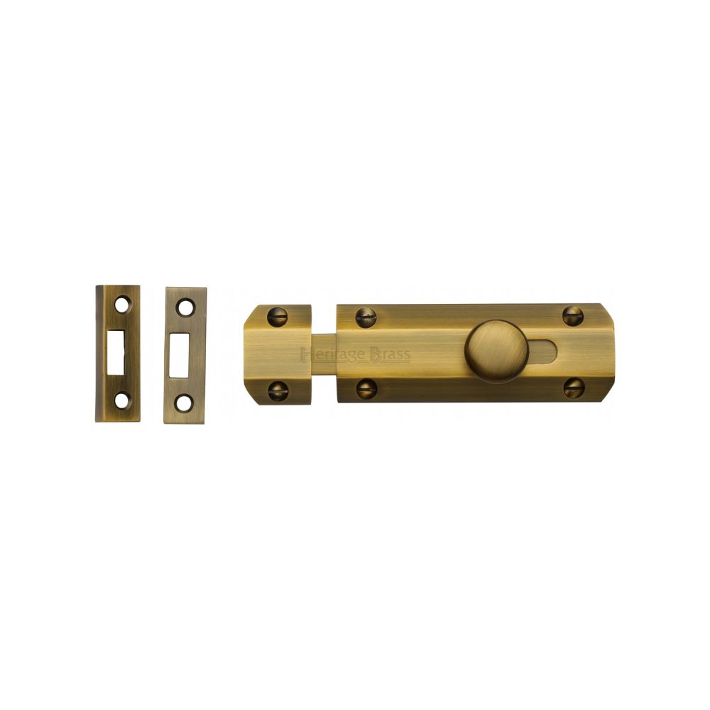 This is an image of a Heritage Brass - Door Bolt Flat 4" Antique Brass Finish, c1685-4-at that is available to order from T.H Wiggans Ironmongery in Kendal.