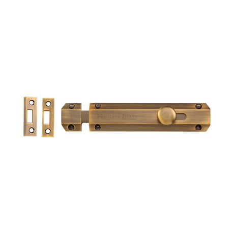 This is an image of a Heritage Brass - Door Bolt Flat 6" Antique Brass Finish, c1685-6-at that is available to order from T.H Wiggans Ironmongery in Kendal.