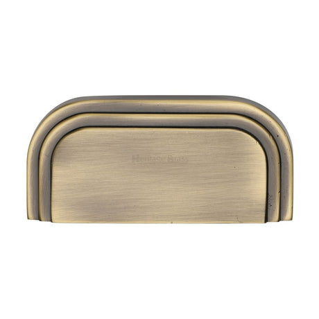 This is an image of a Heritage Brass - Drawer Cup Pull Bauhaus Design 76mm CTC Antique Brass Finish, c1740-at that is available to order from T.H Wiggans Ironmongery in Kendal.