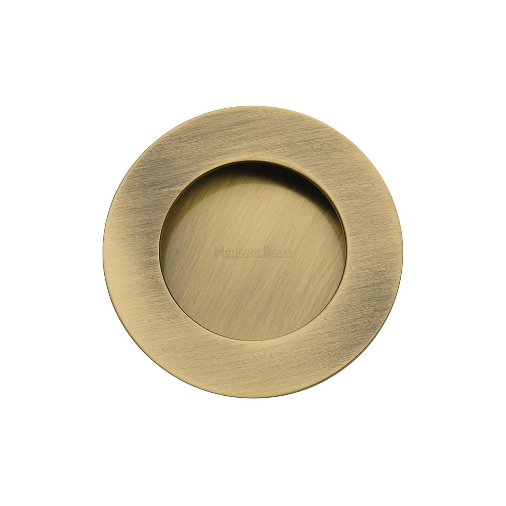 This is an image of a Heritage Brass - Round Flush Pull Antique Brass Finish, c1835-at that is available to order from T.H Wiggans Ironmongery in Kendal.