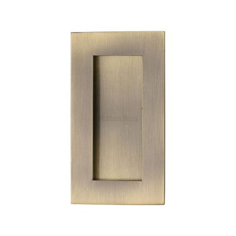 This is an image of a Heritage Brass - Rectangular Flush Pull 105 x 58mm Antique Brass Finish, c1855-105-at that is available to order from T.H Wiggans Ironmongery in Kendal.