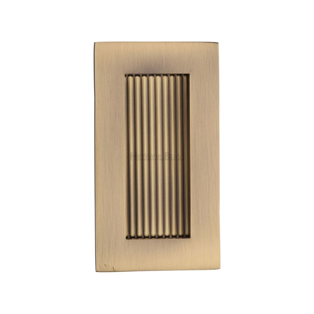 This is an image of a Heritage Brass - Reeded Rectangular Flush Pull 105 x 58mm Antique Brass Finish, c1865-105-at that is available to order from T.H Wiggans Ironmongery in Kendal.