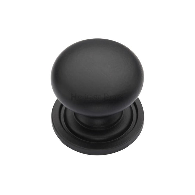 This is an image of a Heritage Brass - Cabinet Knob Victorian Round Design with base 25mm Matt Black F, c2240-25-bkmt that is available to order from T.H Wiggans Ironmongery in Kendal.