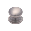 This is an image of a Heritage Brass - Cabinet Knob Victorian Round Design with base 25mm Satin Nickel, c2240-25-sn that is available to order from T.H Wiggans Ironmongery in Kendal.