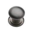 This is an image of a Heritage Brass - Cabinet Knob Victorian Round Design with base 32mm Matt Bronze, c2240-32-mb that is available to order from T.H Wiggans Ironmongery in Kendal.