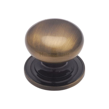 This is an image of a Heritage Brass - Cabinet Knob Victorian Round Design with base 38mm Antique Brass F, c2240-38-at that is available to order from T.H Wiggans Ironmongery in Kendal.