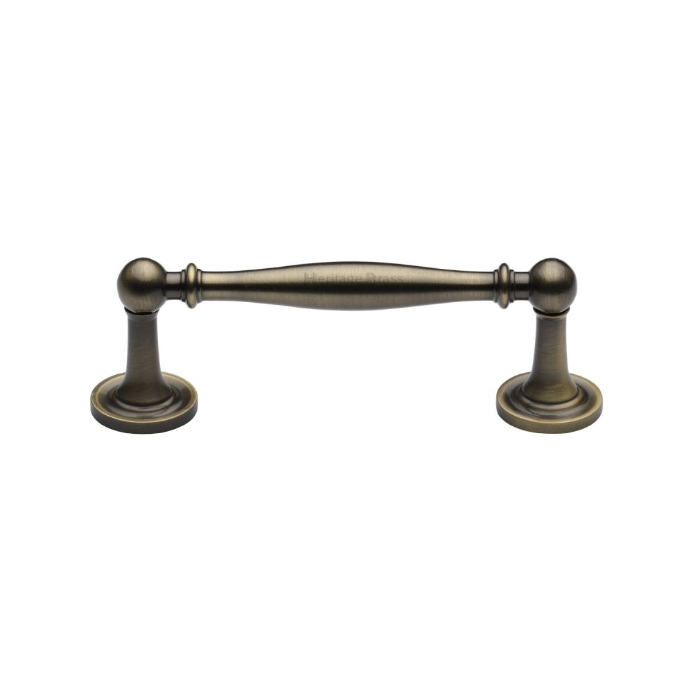 This is an image of a Heritage Brass - Cabinet Pull Colonial Design 96mm CTC Antique Brass Finish, c2533-96-at that is available to order from T.H Wiggans Ironmongery in Kendal.