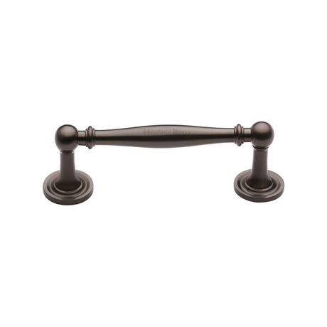 This is an image of a Heritage Brass - Cabinet Pull Colonial Design 96mm CTC Matt Bronze Finish, c2533-96-mb that is available to order from T.H Wiggans Ironmongery in Kendal.