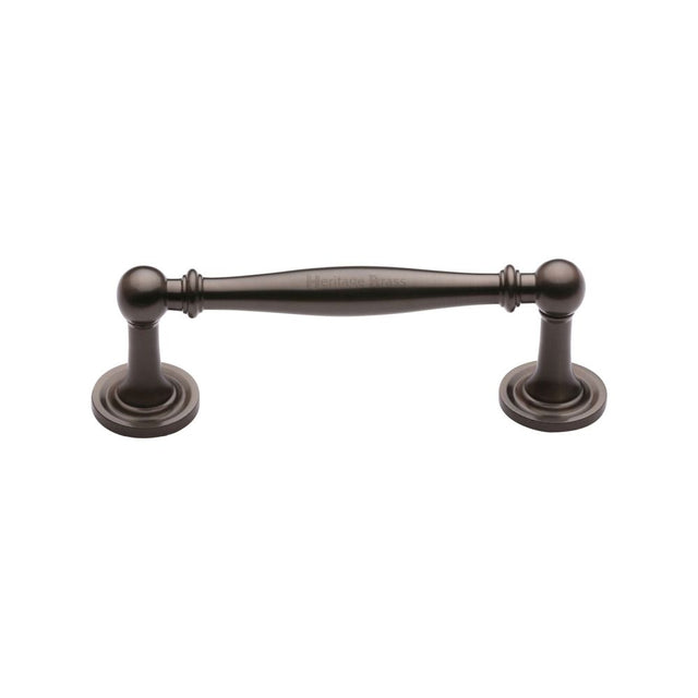 This is an image of a Heritage Brass - Cabinet Pull Colonial Design 96mm CTC Matt Bronze Finish, c2533-96-mb that is available to order from T.H Wiggans Ironmongery in Kendal.