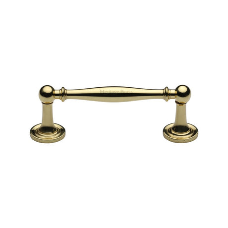 This is an image of a Heritage Brass - Cabinet Pull Colonial Design 96mm CTC Polished Brass Finish, c2533-96-pb that is available to order from T.H Wiggans Ironmongery in Kendal.