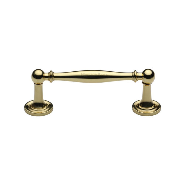 This is an image of a Heritage Brass - Cabinet Pull Colonial Design 96mm CTC Polished Brass Finish, c2533-96-pb that is available to order from T.H Wiggans Ironmongery in Kendal.