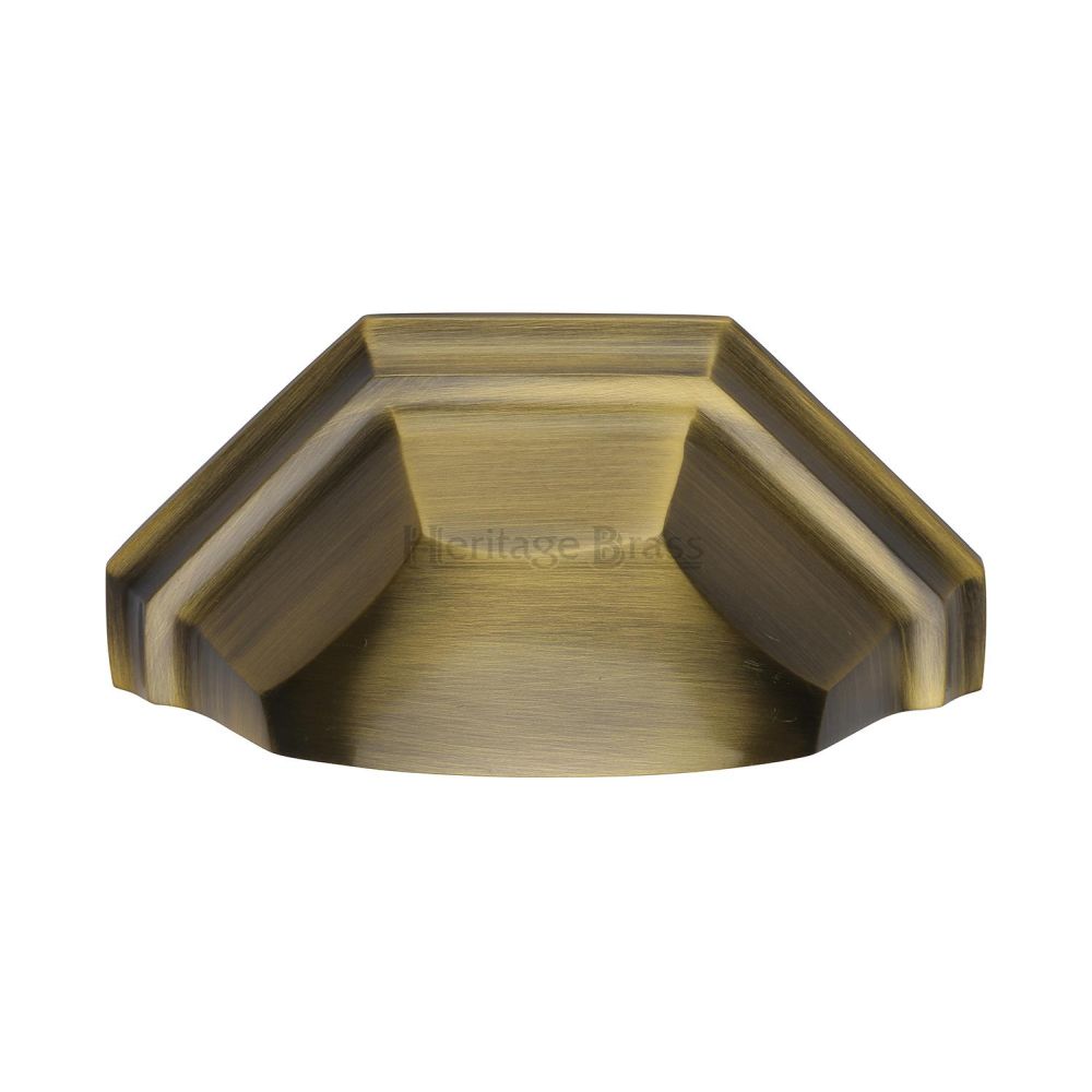 This is an image of a Heritage Brass - Drawer Cup Pull Deco Design 89mm CTC Antique Brass Finish, c2768-at that is available to order from T.H Wiggans Ironmongery in Kendal.