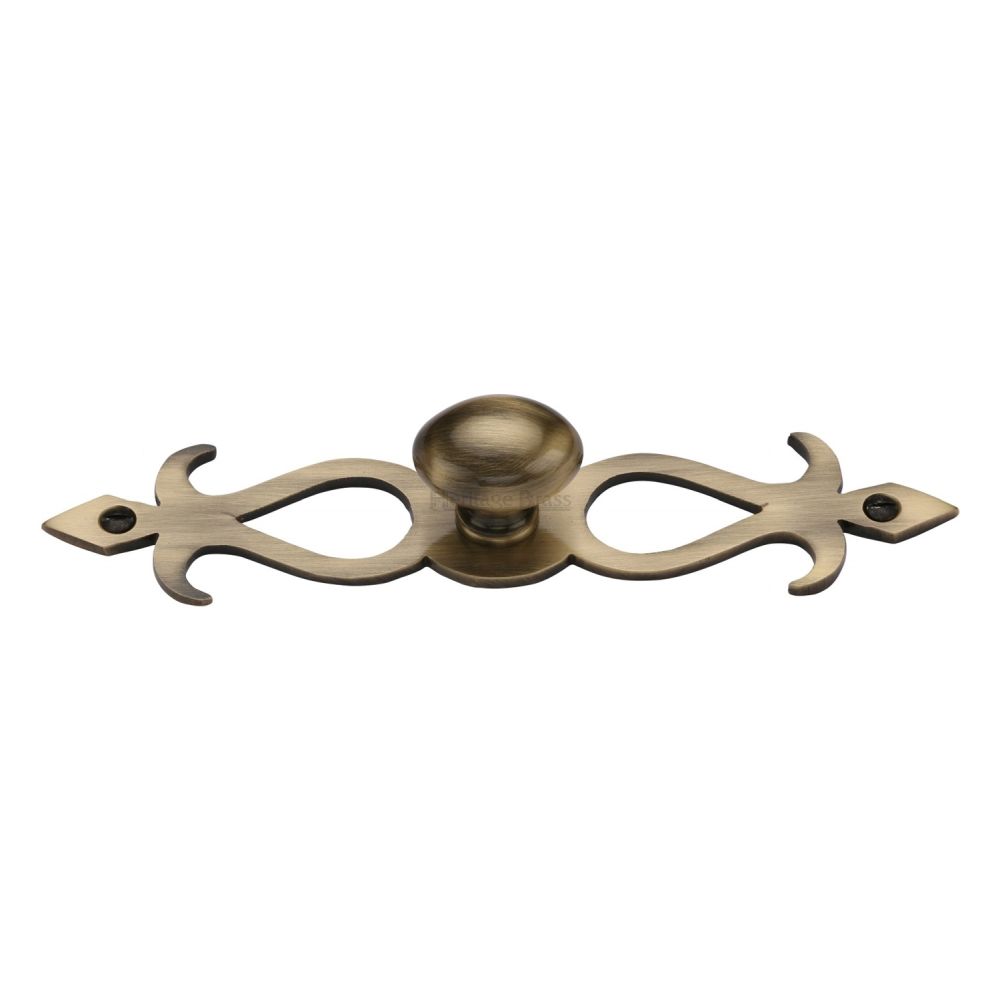 This is an image of a Heritage Brass - Cabinet Knob Oval/Backplate Design 32mm Antique Brass Finish, c3072-32-at that is available to order from T.H Wiggans Ironmongery in Kendal.