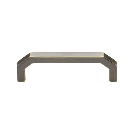 This is an image of a Heritage Brass - Cabinet Pull Hex Angular Design 101mm CTC Antique Brass Finish, c3465-101-at that is available to order from T.H Wiggans Ironmongery in Kendal.