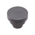 This is an image of a Heritage Brass - Cabinet Knob Round Stepped Design 32mm Matt Black Finish, c3624-32-bkmt that is available to order from T.H Wiggans Ironmongery in Kendal.