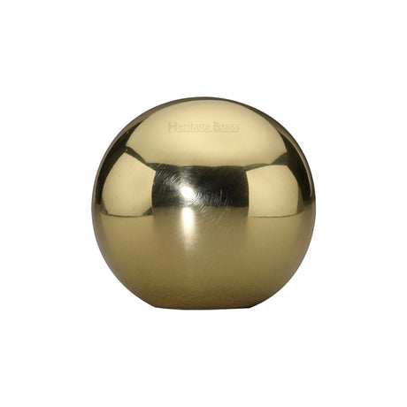 This is an image of a Heritage Brass - Cabinet Knob Globe Design 25mm Polished Brass Finish, c3627-pb that is available to order from T.H Wiggans Ironmongery in Kendal.