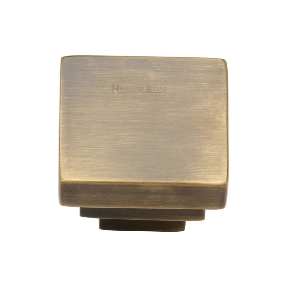 This is an image of a Heritage Brass - Cabinet Knob Square Stepped Design 32mm Antique Brass Finish, c3672-32-at that is available to order from T.H Wiggans Ironmongery in Kendal.