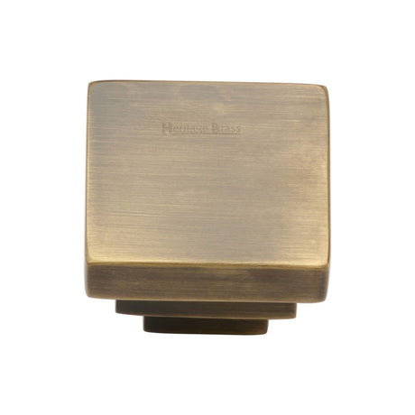 This is an image of a Heritage Brass - Cabinet Knob Square Stepped Design 32mm Antique Brass Finish, c3672-32-at that is available to order from T.H Wiggans Ironmongery in Kendal.