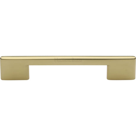 This is an image of a Heritage Brass - Cabinet Pull Slim Metro Design 128mm CTC Polished Brass Finish, c3681-128-pb that is available to order from T.H Wiggans Ironmongery in Kendal.