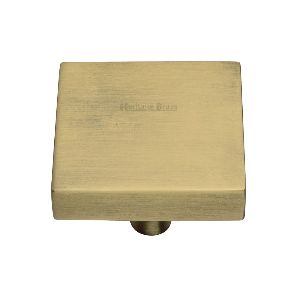This is an image of a Heritage Brass - Cabinet Knob Square Design 38mm Antique Brass Finish, c3685-38-at that is available to order from T.H Wiggans Ironmongery in Kendal.