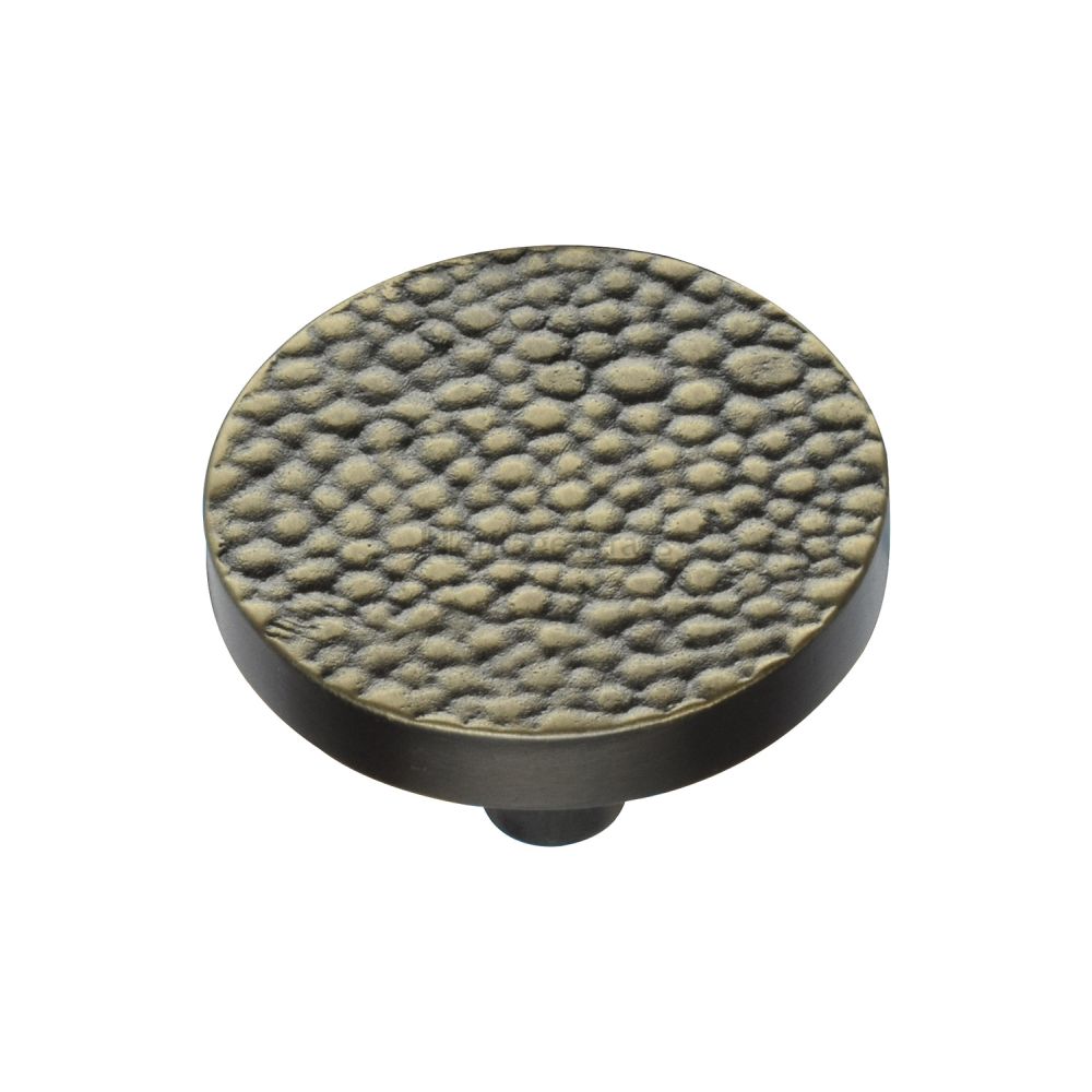 This is an image of a Heritage Brass - Cabinet Knob Round Stingray Design 38mm Aged Brass Finish, c3686-38-ab that is available to order from T.H Wiggans Ironmongery in Kendal.