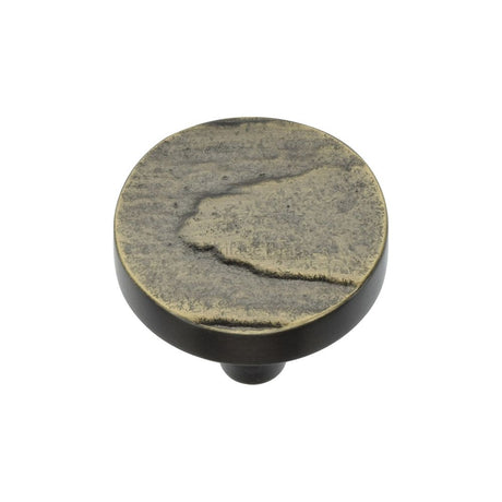 This is an image of a Heritage Brass - Cabinet Knob Round Pine Design 32mm Aged Brass Finish, c3697-32-ab that is available to order from T.H Wiggans Ironmongery in Kendal.
