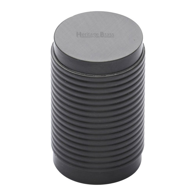 This is an image of a Heritage Brass - Cabinet Knob Cylindric Ribbed Design 21mm Matt Bronze Finish, c3850-mb that is available to order from T.H Wiggans Ironmongery in Kendal.