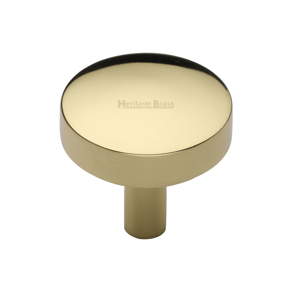 This is an image of a Heritage Brass - Cabinet Knob Domed Disc Design 32mm Polished Brass Finish, c3875-32-pb that is available to order from T.H Wiggans Ironmongery in Kendal.