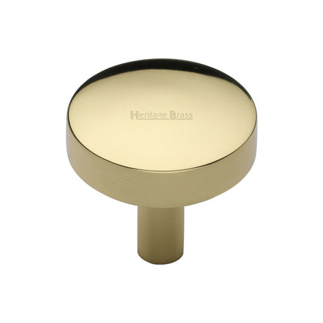 This is an image of a Heritage Brass - Cabinet Knob Domed Disc Design 32mm Polished Brass Finish, c3875-32-pb that is available to order from T.H Wiggans Ironmongery in Kendal.