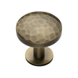 This is an image of a Heritage Brass - Cabinet Knob Round Hammered Design with Rose 32mm Antique Brass Fi, c3876-32-at that is available to order from T.H Wiggans Ironmongery in Kendal.