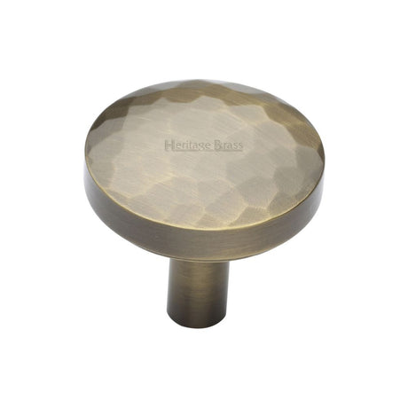 This is an image of a Heritage Brass - Cabinet Knob Round Hammered Design 32mm Antique Brass Finish, c3877-32-at that is available to order from T.H Wiggans Ironmongery in Kendal.