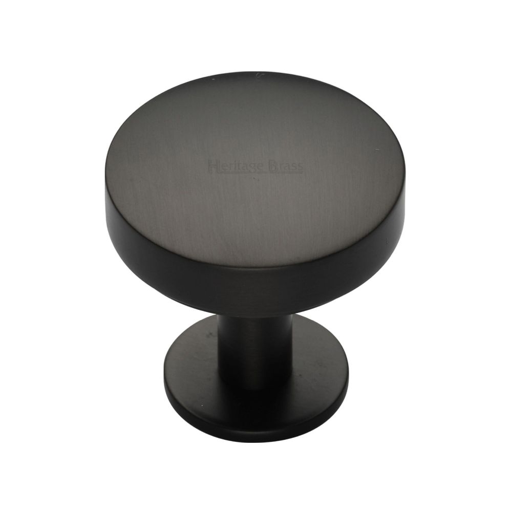 This is an image of a Heritage Brass - Cabinet Knob Domed Disc Design with Rose 32mm Matt Bronze Finis, c3878-32-mb that is available to order from T.H Wiggans Ironmongery in Kendal.