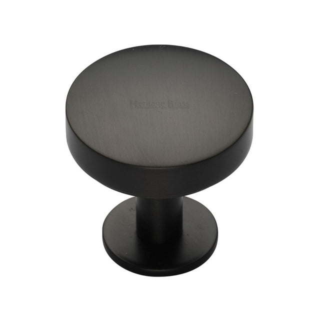 This is an image of a Heritage Brass - Cabinet Knob Domed Disc Design with Rose 32mm Matt Bronze Finis, c3878-32-mb that is available to order from T.H Wiggans Ironmongery in Kendal.